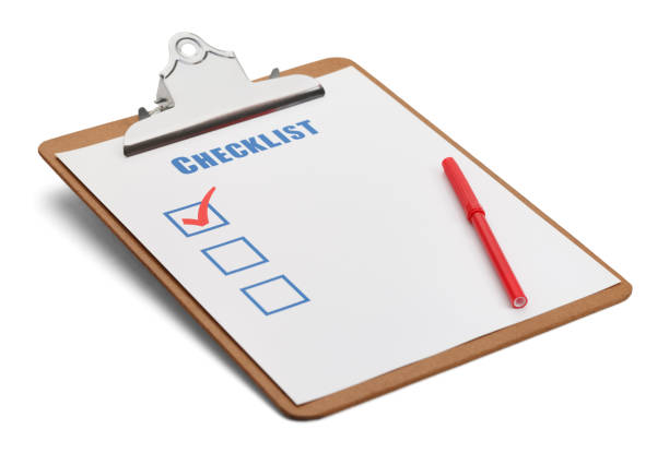 Classic Clipboard with Checklist and Red Pen Isolated on White Background.