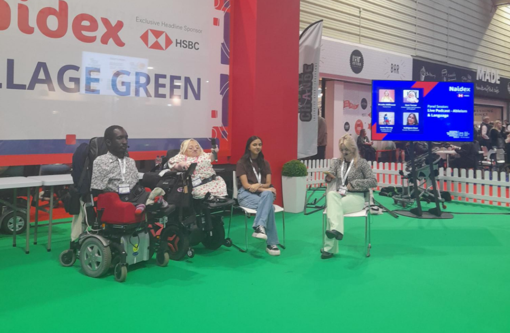 From left to right: Isaac Harvey, a black man in a patterned shirt and power chair. Gem Turner, a caucasian woman with blonde hair in a power chair. Sukhjeen Kaur, an asian woman in a brown t-shirt and jeans. Brooke Millhouse, a caucasian woman with blonde hair and green trousers.