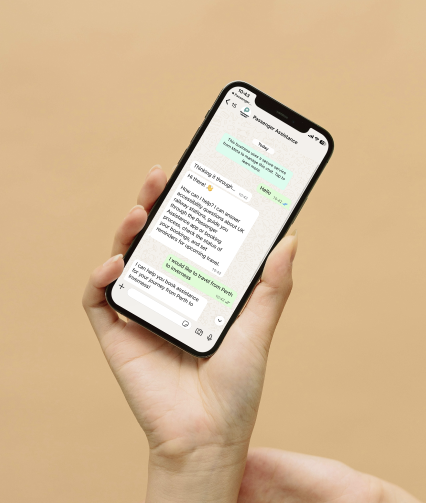 A phone showing Ask PA, the Passenger Assistance WhatsApp service for train assistance.