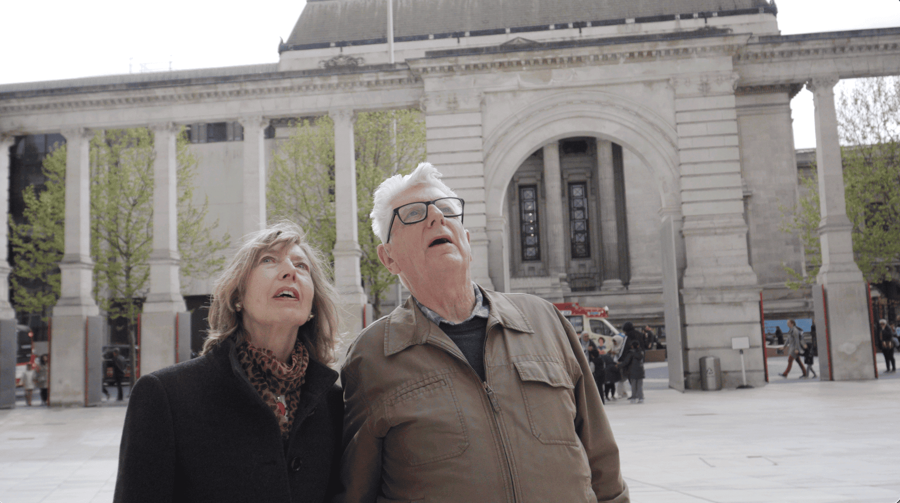 Steve and Irene visiting a museum and looking up